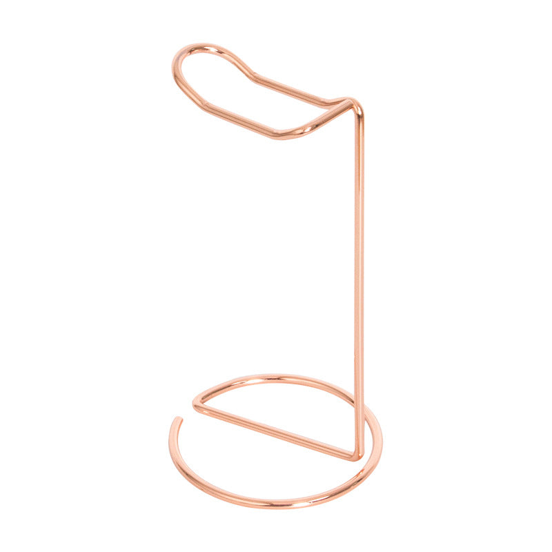 Support casque gaming en métal finition or rose élégant